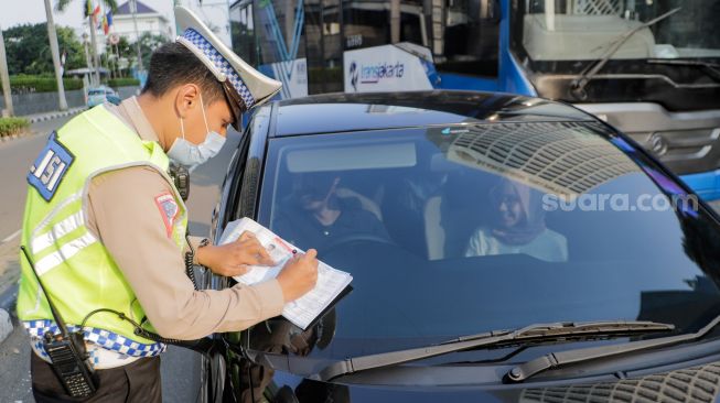 Tilang Manual Ditiadakan Selama Libur Nataru, Polisi Diminta Tetap Tegas